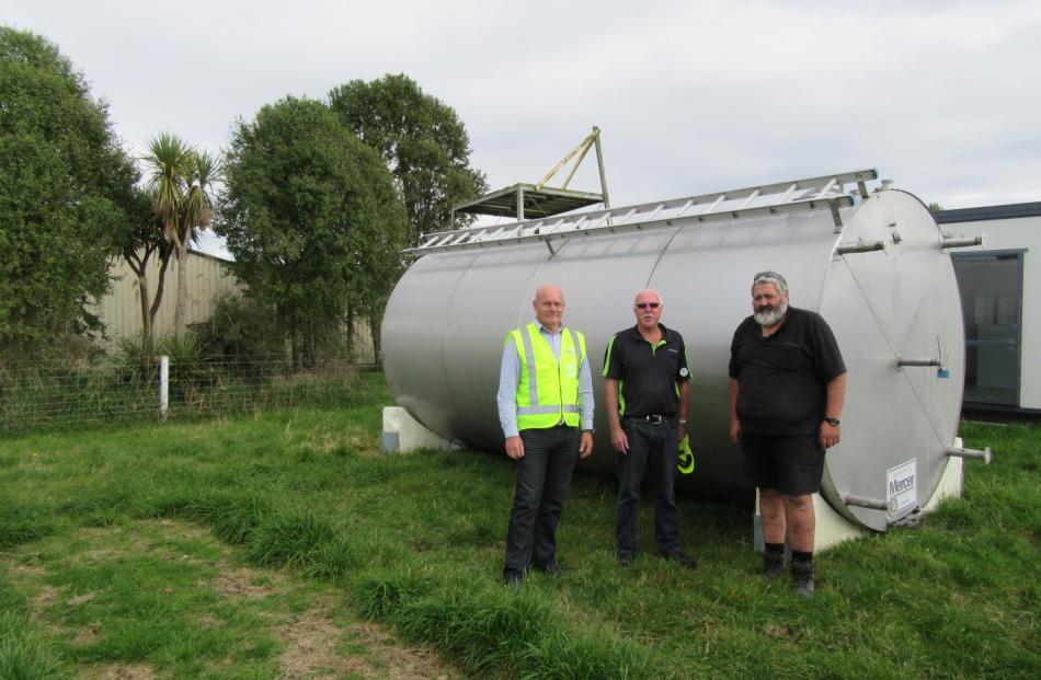 Standing in front of the milk vat at its new home are (from left) Fonterra Studholme operations manager Alan Maitland, Fonterra farm vat assets manager John Welsh and Te Runanga o Waihao chairman Graeme Lane. 