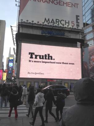 An electronic billboard in Times Square advertising The New York Times, reads: ‘‘Truth. It’s more...