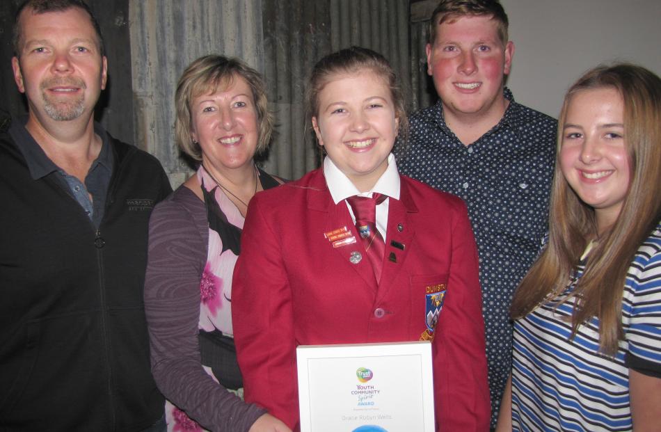 From left: Blair Wells, Damianne Wells, Grace Wells (18), Tom Richmond and Elizabeth Wells (14)