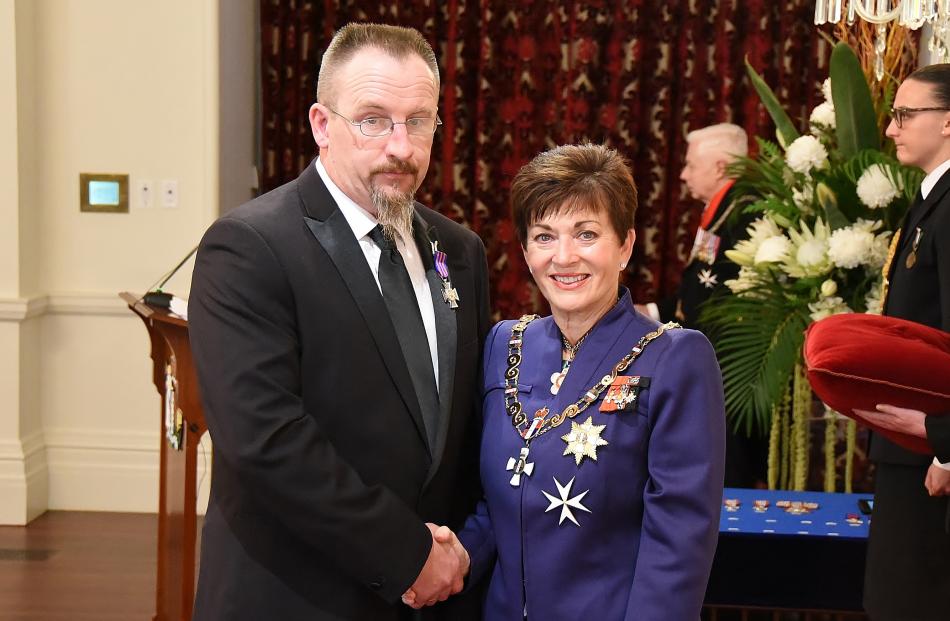 Chris Foot accepts congratulations on his New Zealand Bravery Decoration from Governor-General Dame Patsy Reddy in Wellington yesterday. Photos: Government House.