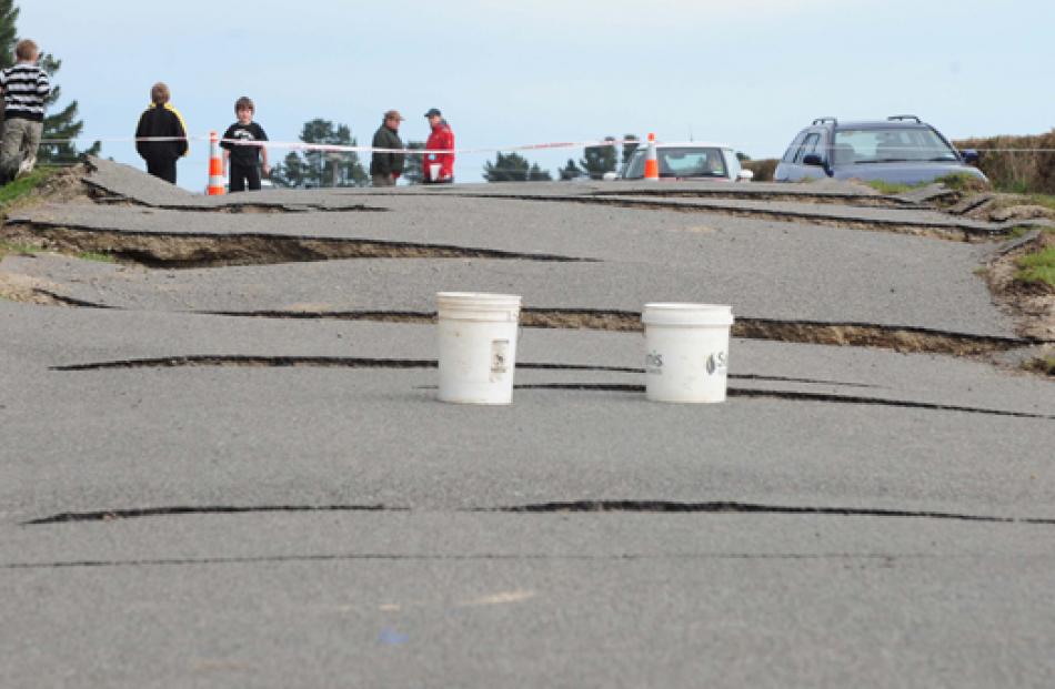 Damage to Highfield Rd, Kirwee, near the epicentre of the quake. The previously straight road has...