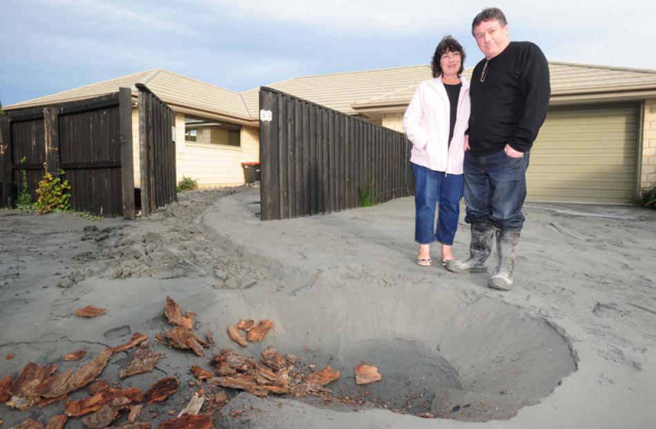 The result of silt volcanoes outside Maxine and Barrie Smith's Bexley home, which will have to be...
