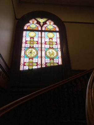 A stained-glass window in Alva House.