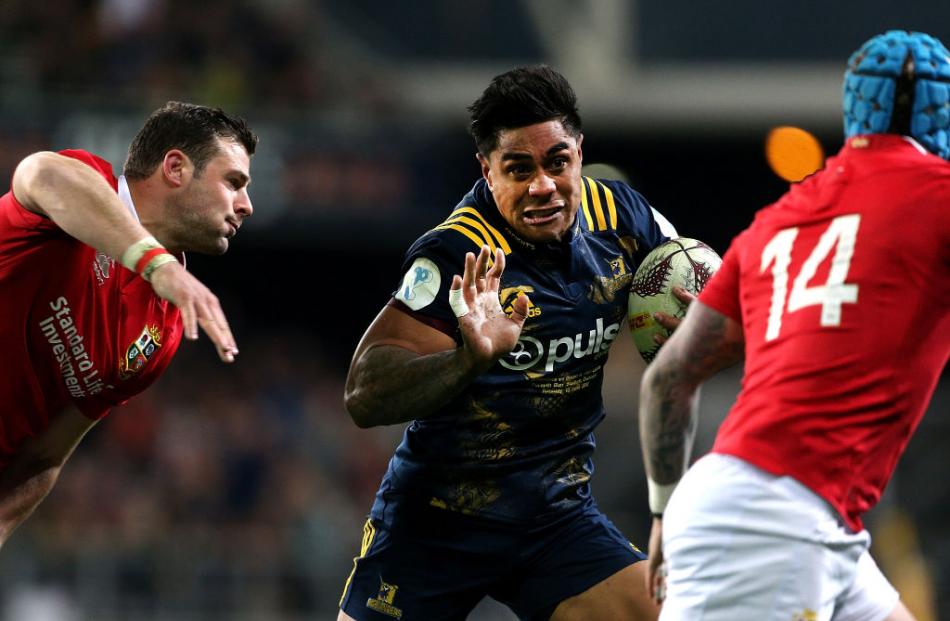 Malakai Fekitoa runs the ball up for the Highlanders against the Lions. Photo: Getty Images