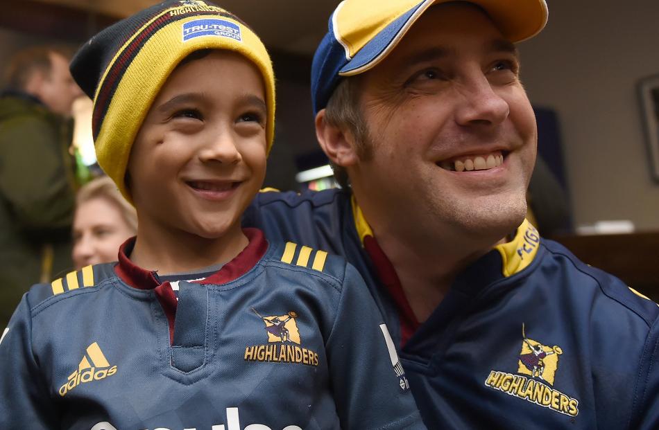 Father and son Max (6) and Dan Paterson, of Christchurch, show who they really support in Dunedin...