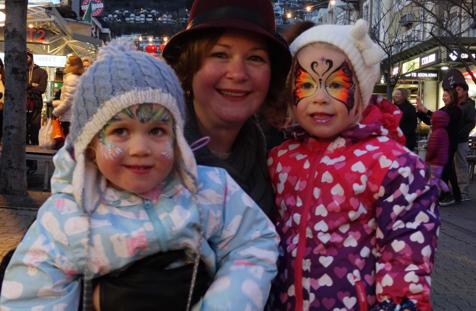Queenstown youngsters Halina (2, left) and big sister Emma (4) enjoyed Carnival Day yesterday with mum Lizzie Barowy. Photo: Louise Scott