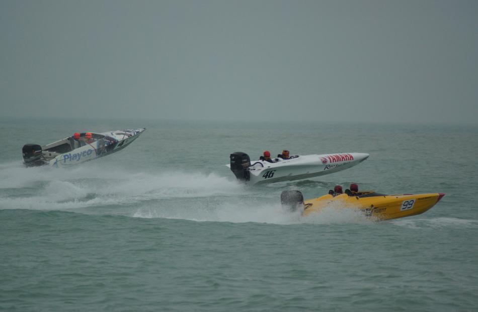 Boats slice their way through waves on Saturday in the Oamaru leg of the New Zealand Boat Marathon Commission race series. Photo: Selena McDermott.