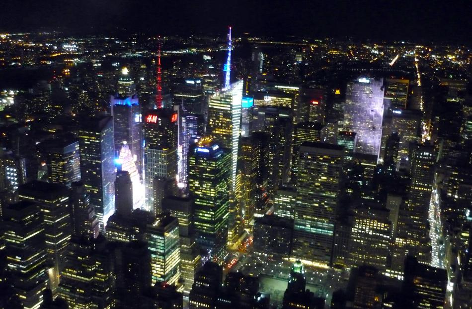 The bright lights of Times Square from the Empire State Building.