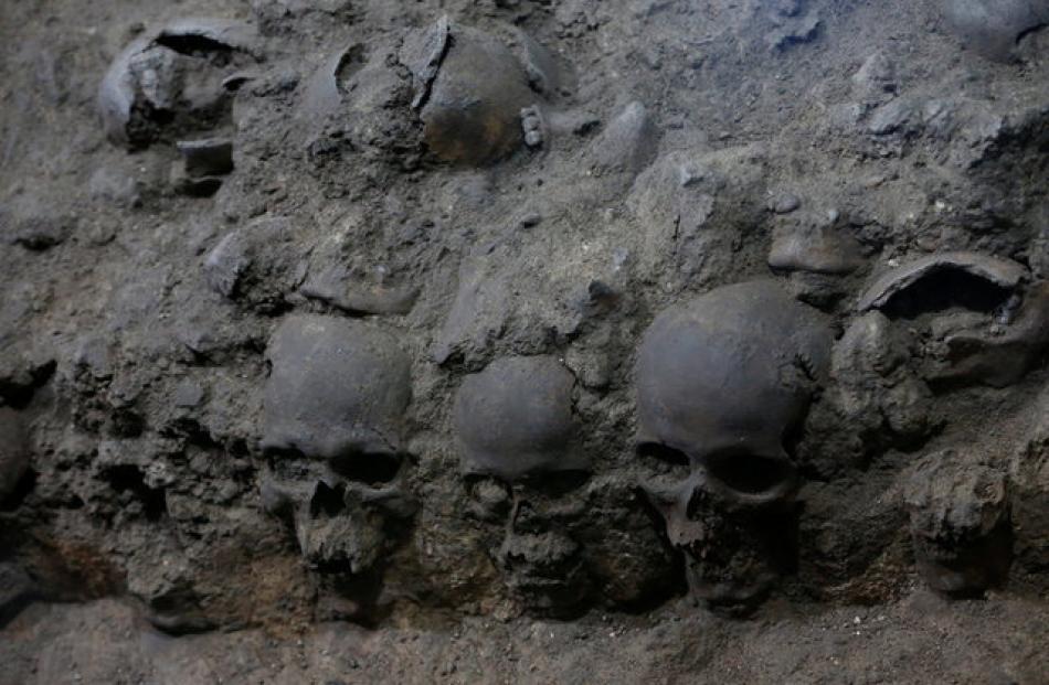 Archaeologists have found more than 650 skulls caked in lime and thousands of fragments in the cylindrical edifice near the site of the Templo Mayor. Photo: Reuters