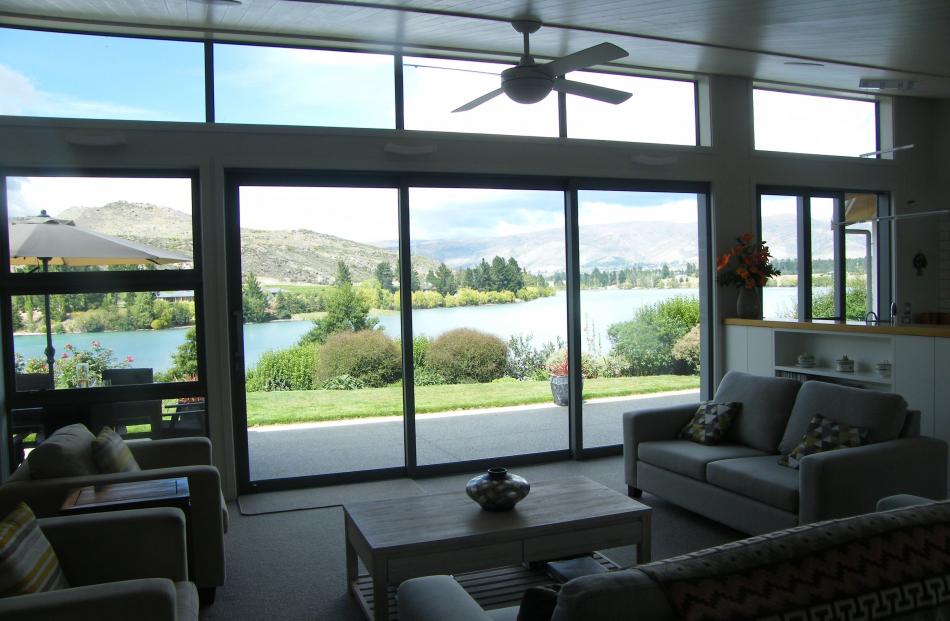 Large glass doors and windows allow optimum viewing of Lake Dunstan. 