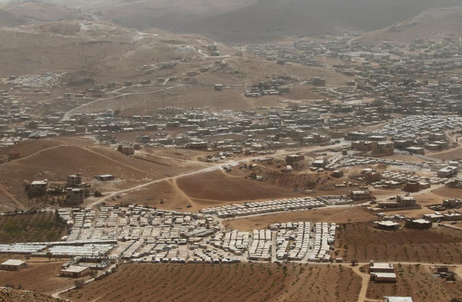 Syrian refugee camps dotted in and around the Lebanese town of Arsal, near the border with Syria, in this file photo from September 2016. 