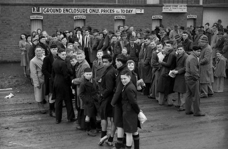 The Turnstile Building in its heyday, with fans waiting to get into the ground for Otago's first...