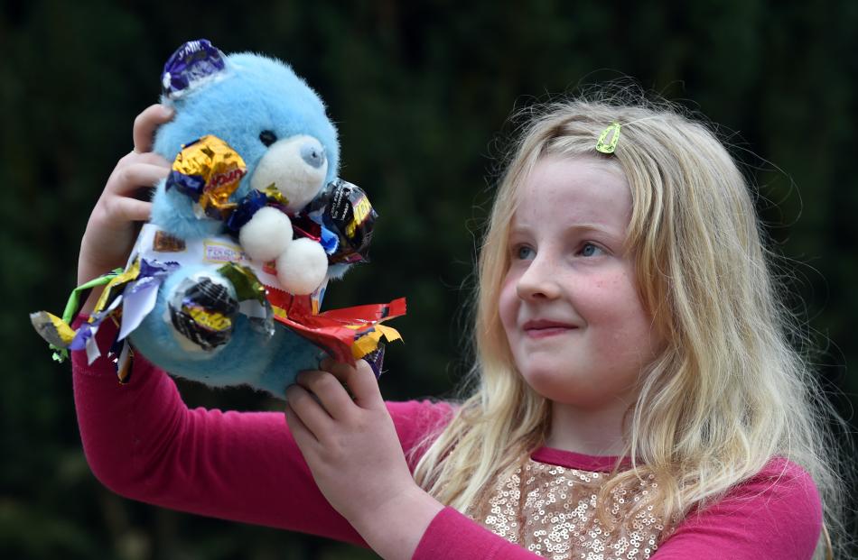 Breana Geddes-Pringle (8), of Oamaru, shows off her teddy, Miss Cadbury. Photos: Peter McIntosh.