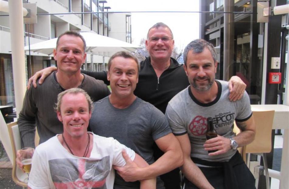 Unwinding with a couple of drinks are (front from left) Rob Drysdale and Shane Andrews, of...