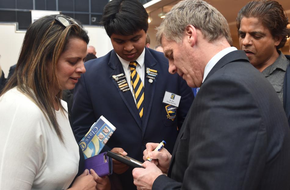 Neeta Shetty and Om Alva, of Wakatipu High School, Bill English  and Krish Shetty, of Queenstown.  