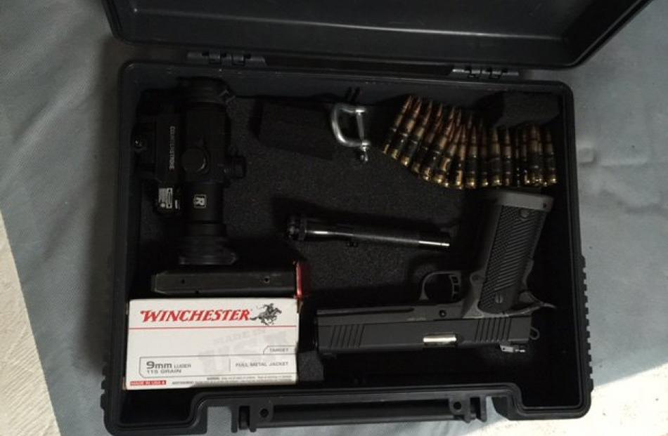 A pistol and ammunition stolen from Maitland St. Photos: NZ Police.