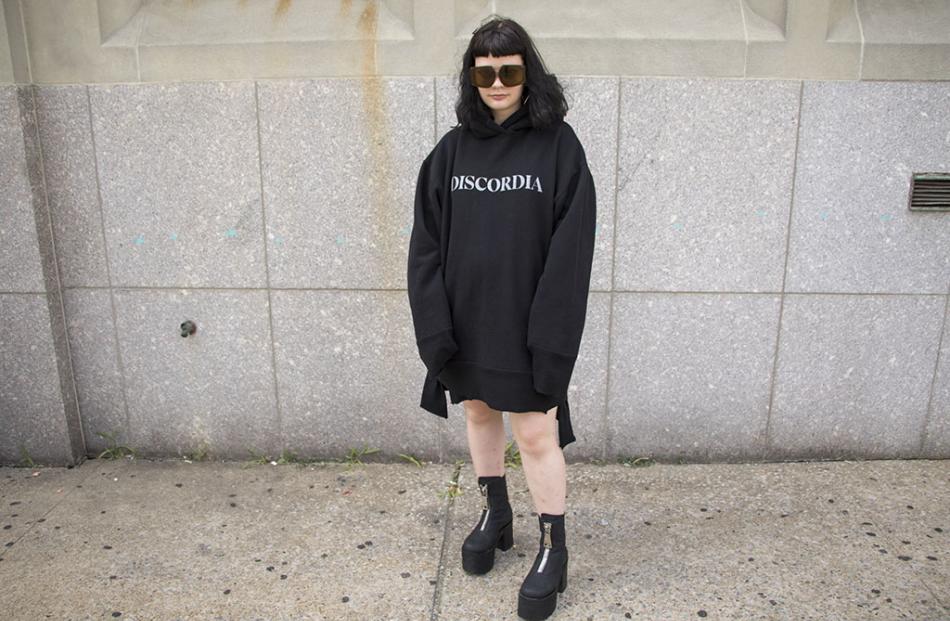 Julia wears JPalm 'Discordia Hoodie', Karen Walker Eyewear, Dolls Kill Boots.