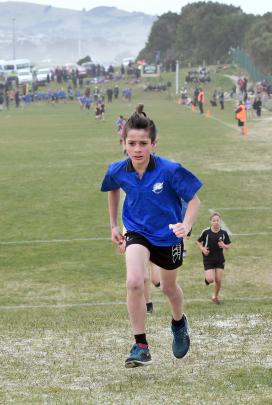 St Clair pupil Mana Martin (10) climbs a hill on his way to third place in the years 5 and 6 boys race.