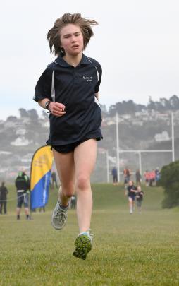 Portobello's Anya Rhodes (11) wins the years 5 and 6 race, edging sister Lila (9), who took...