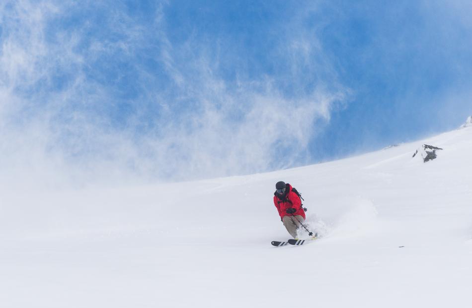 A skier enjoys the conditions at the Remarkables Queenstown before heavy a snowfall on Saturday...