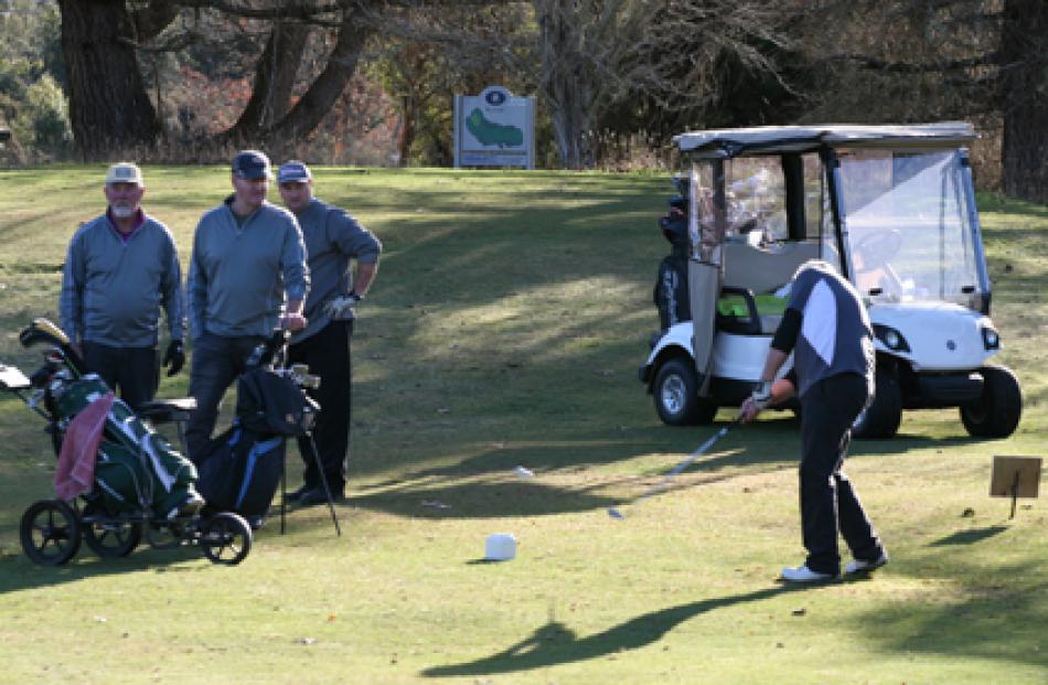 Sam Shefford teeing off on hole 17 on day one with Shaun Coombe, Phil McDonald and Brian Hewett...