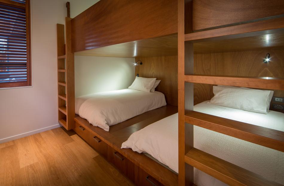 Two of the four guest rooms have Japanese-style sleeping platforms. The mattresses are on sliding...
