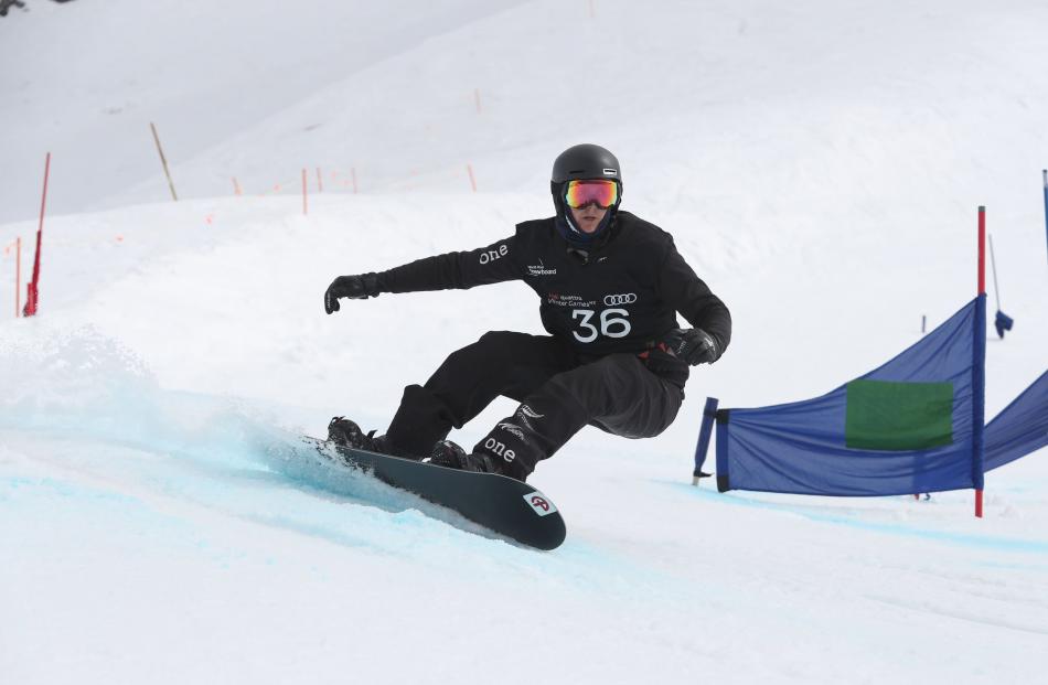 New Zealander Carl Murphy on his way to the fouth- fastest time in the world para snowboard...
