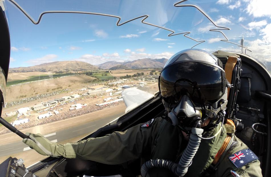 Royal Australian Air Force fighter jet pilot making a pass over the airshow.