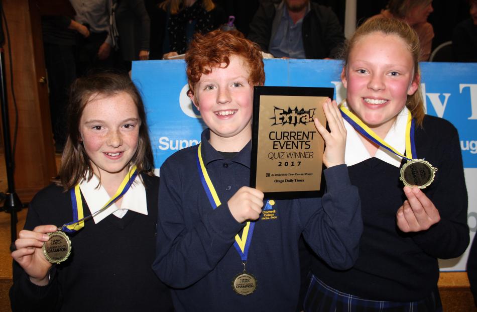 Cromwell College pupils Charlotte Fluksa (11, left), Flynn Wilson (11) and Simone Wilson (11) score top marks in the year 7 and 8 section. Photos: Jono Edwards
