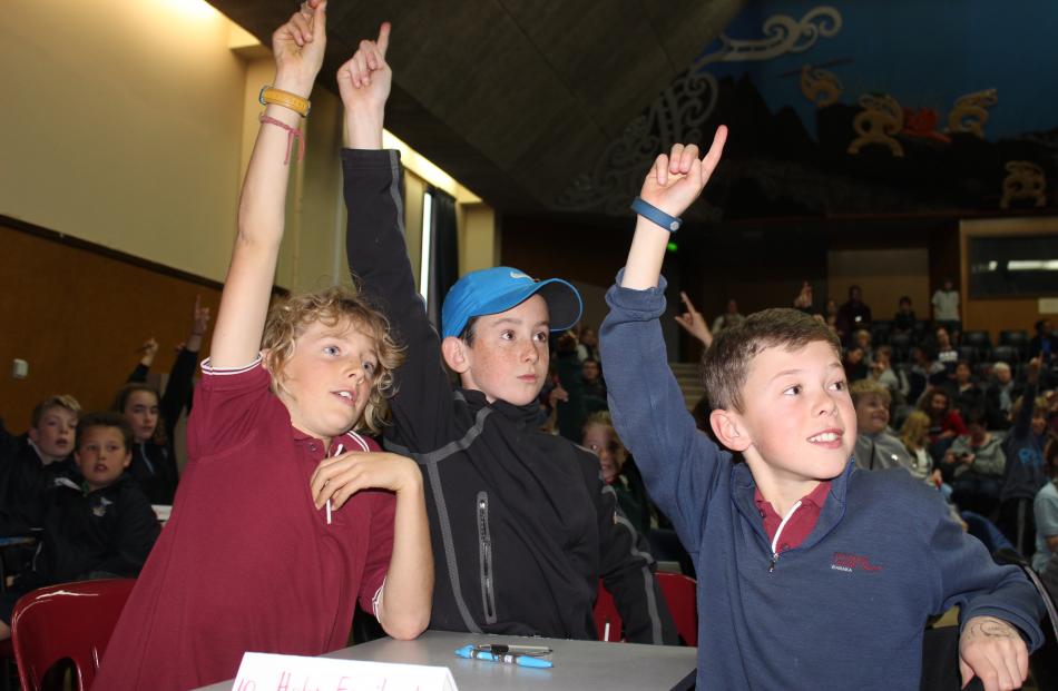Nat Warburton (10, left), Flynn Phillips (10) and Thomas Mitchell (10), of Holy Family School in...