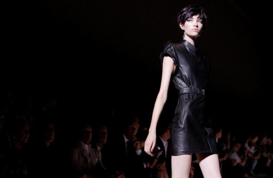 Tom Ford's collection switched between soft playful flashy dresses to ones with more of a hard, edgey look. Photo: Reuters