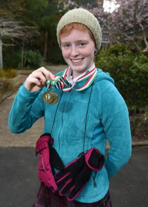 Logan Park High School luger Ella Molteno (14) with her two first-place Naseby Cup medals at the school last week. Photo: Gregor Richardson