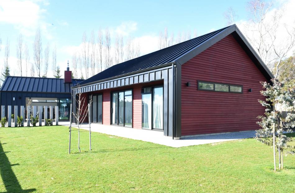 This East Taieri house consists of two pavilions, linked by a glass entrance foyer. Photos:...