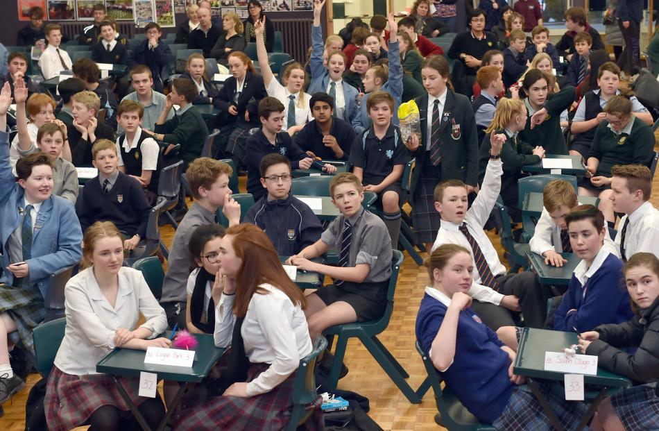 Year 9 and 10 pupils listen to a question during the Otago Daily Times Extra! quiz at Kaikorai...