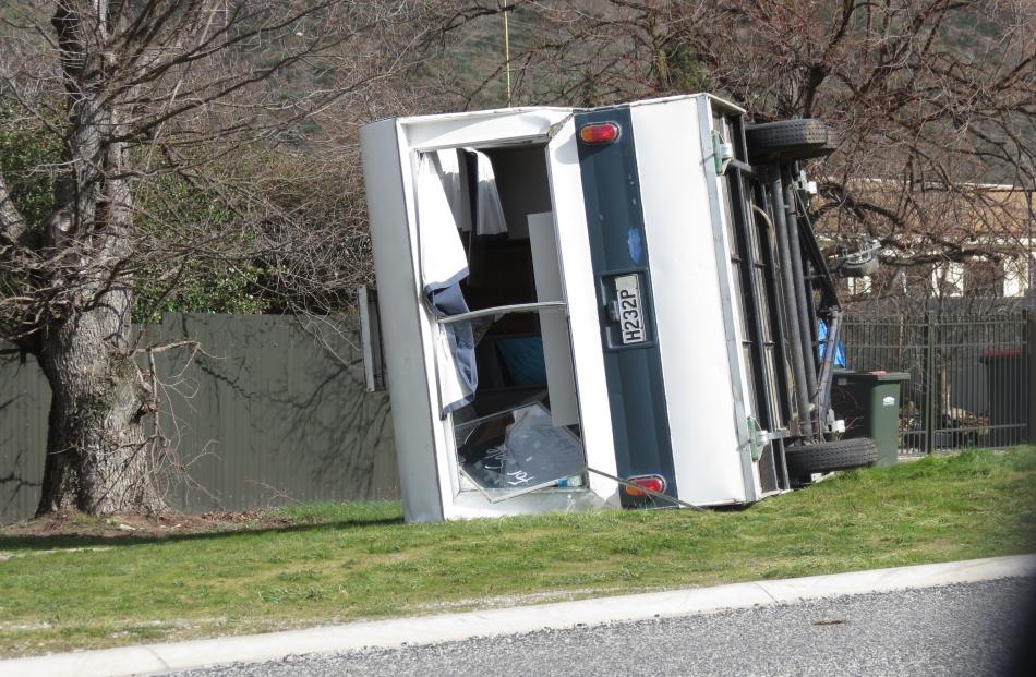 A caravan is blown off its wheels near the Dunstan Golf Course on Sunderland St in Clyde. Photo:...