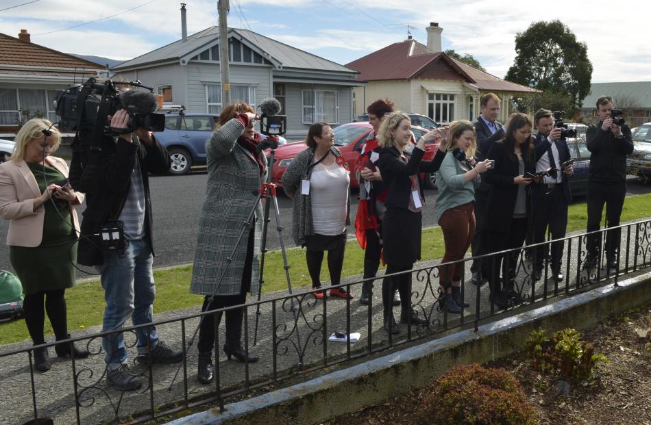 Media outside a Bellona St address wait for a press conference with Labour leader Jacinda Ardern...