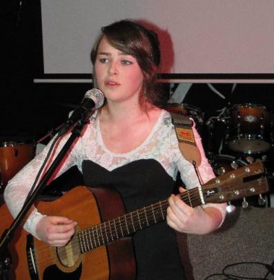 Finalist Sarah Foley (16) performs during the X-it Youth Centre fundraiser dinner.