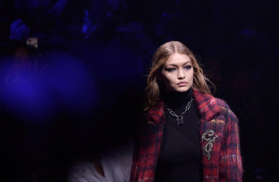 Model Gigi Hadid displays a creation from the Tommy Hilfiger Spring/Summer 2018. Photo: Reuters