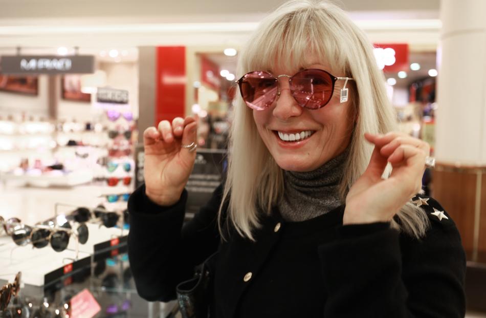 The pink lenses go well with that blonde hair Lana...at the Sunglass Hut