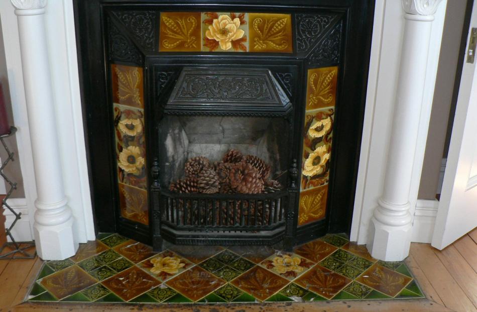 Original features such as the fireplace have been preserved. 