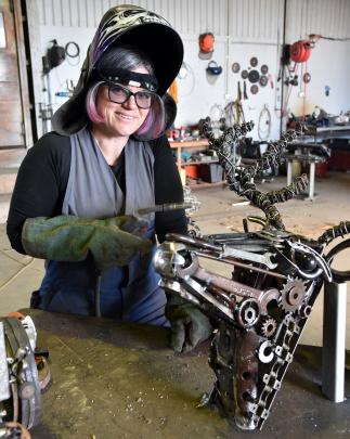 Sara Gillies has mastered the art of welding to make her  metal creations out of vintage finds. Photo: Craig Baxter