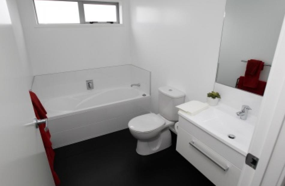 A view of one of the bathrooms inside the first Simple House in Otara, Auckland, Photo by NZPA.