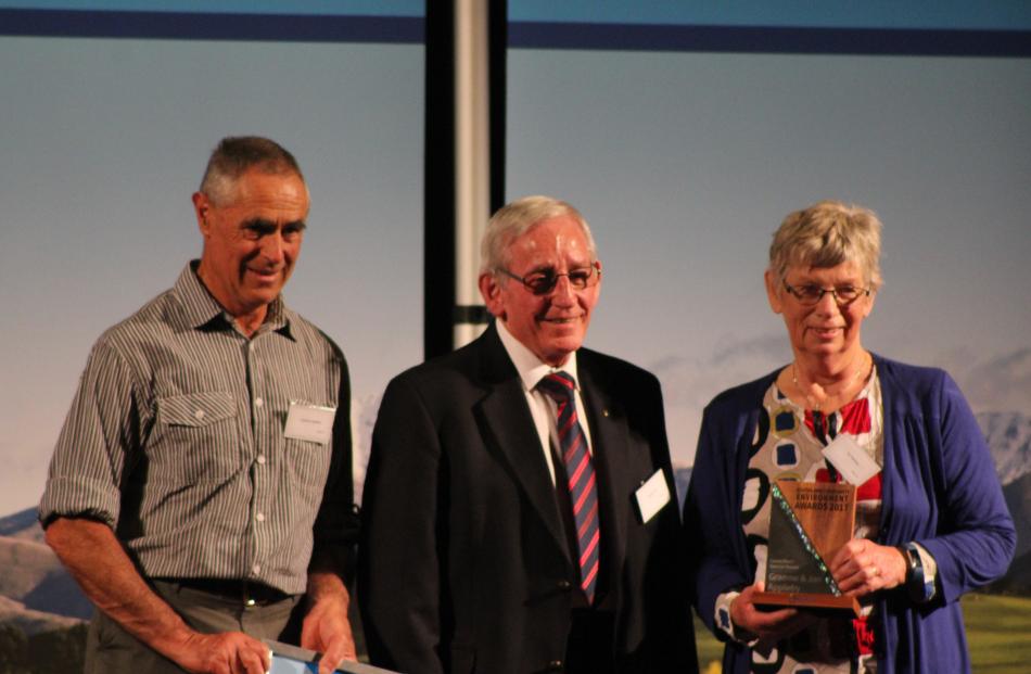 Graeme (left) and Jan Appleby receive the Councillors' Special Award from Environment Southland...