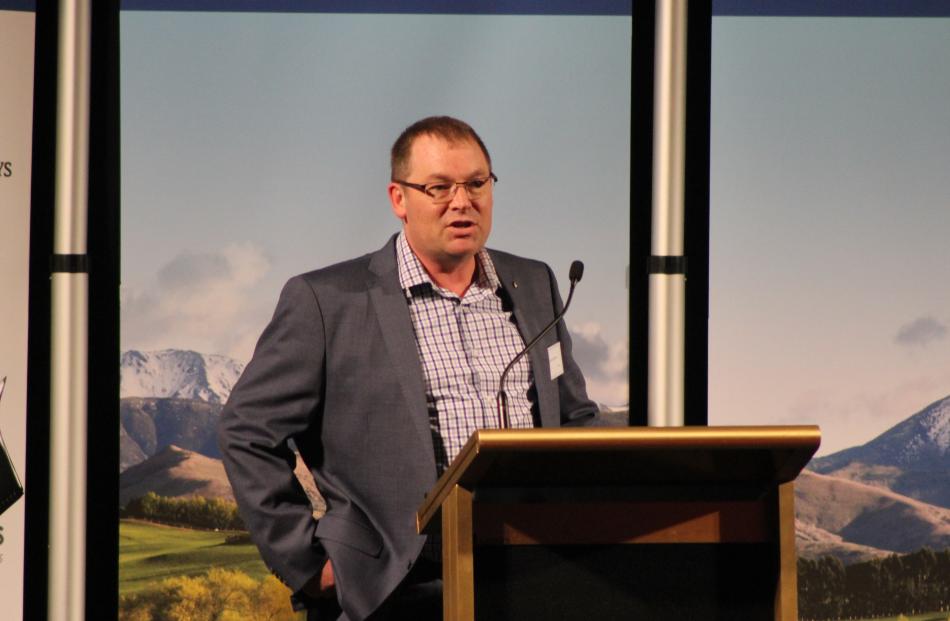 Southland disAbility Enterprises general manager Hamish McMurdo accepts the Environmental...