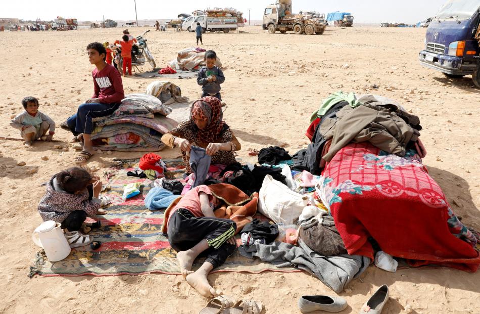 People displaced in fighting between the Syrian Democratic Forces and Islamic State militants are pictured at a refugee camp in Ain Issa, Syria, last month. Photos: Reuters