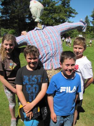 Charlotte Gregan (12, left), Archie McDiarmid (10), Tyne Grant (10) and Will Becker show off the...