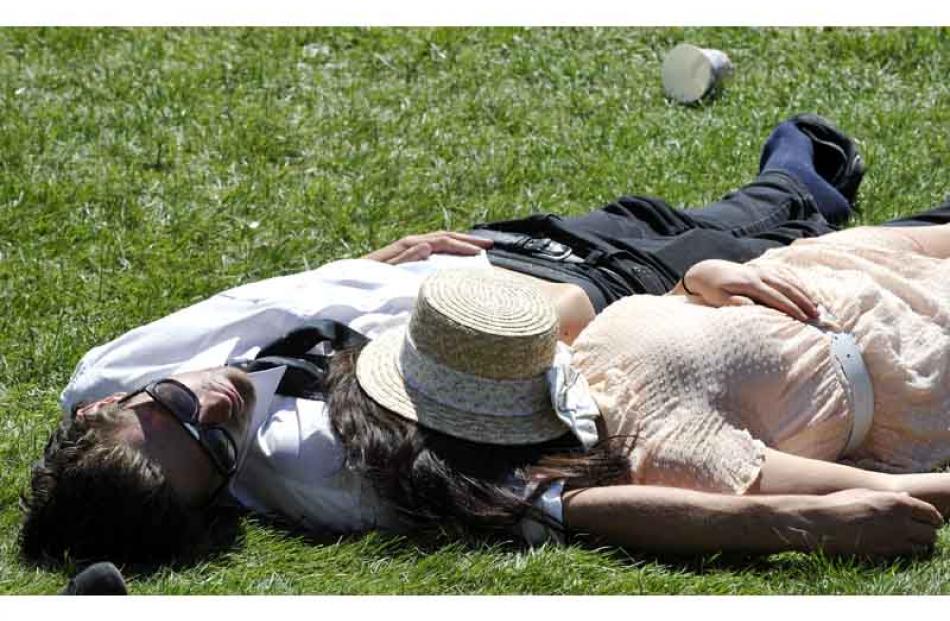 A couple enjoy the sun.