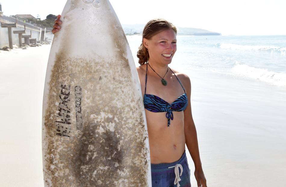 Kamilla Sporsheim, of Norway, was not fazed by the possible threat of a shark reportedly seen at Second Beach the previous night. Photos: Peter McIntosh