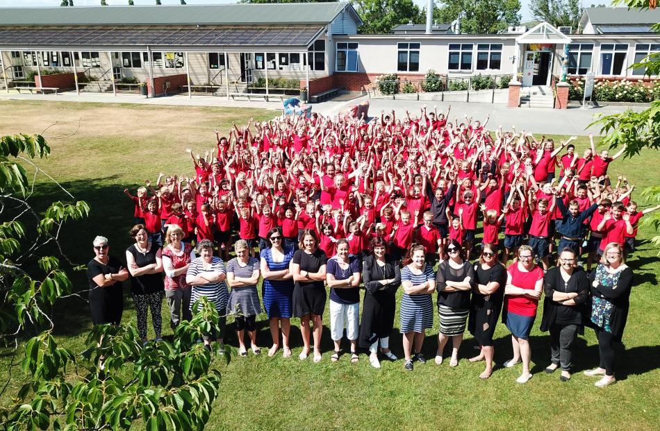 Staff and pupils at West Gore School