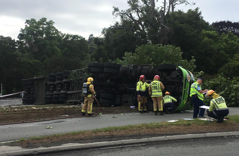A truck on its side at the intersection of Pine Hill Rd and Great King St. Photo: Gerard O'Brien